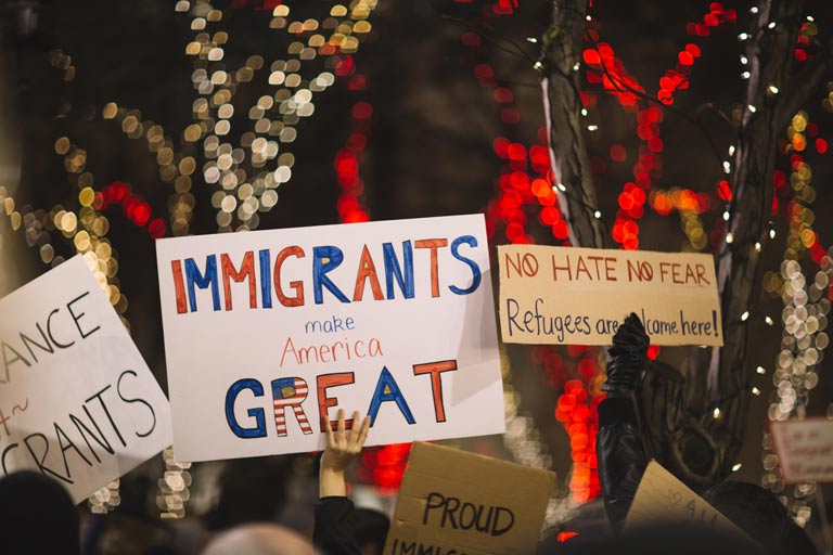 Homemade protest signs supporting immigrants